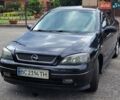 Черный Опель Астра, объемом двигателя 1.4 л и пробегом 268 тыс. км за 3500 $, фото 1 на Automoto.ua