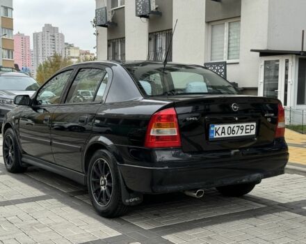 Черный Опель Астра, объемом двигателя 1.4 л и пробегом 205 тыс. км за 3900 $, фото 2 на Automoto.ua