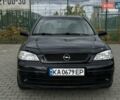 Черный Опель Астра, объемом двигателя 1.4 л и пробегом 205 тыс. км за 3800 $, фото 7 на Automoto.ua