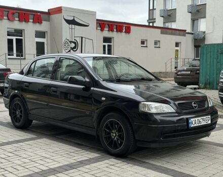 Черный Опель Астра, объемом двигателя 1.4 л и пробегом 205 тыс. км за 3900 $, фото 6 на Automoto.ua