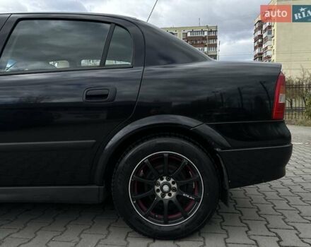 Черный Опель Астра, объемом двигателя 1.4 л и пробегом 205 тыс. км за 3800 $, фото 12 на Automoto.ua