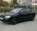 Черный Опель Астра, объемом двигателя 1.4 л и пробегом 205 тыс. км за 3800 $, фото 1 на Automoto.ua