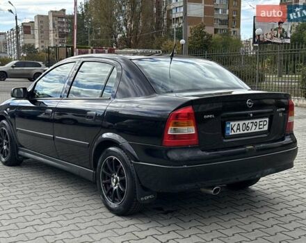 Черный Опель Астра, объемом двигателя 1.4 л и пробегом 205 тыс. км за 3800 $, фото 2 на Automoto.ua