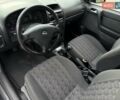 Черный Опель Астра, объемом двигателя 1.4 л и пробегом 205 тыс. км за 3800 $, фото 14 на Automoto.ua