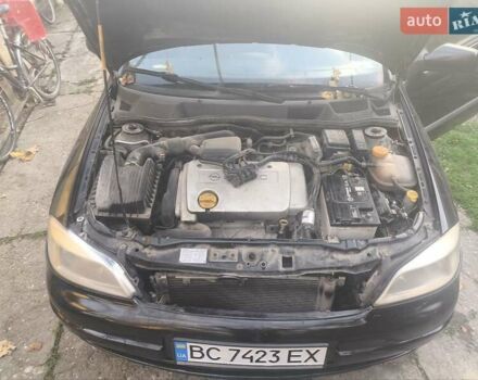 Черный Опель Астра, объемом двигателя 1.4 л и пробегом 250 тыс. км за 1800 $, фото 4 на Automoto.ua