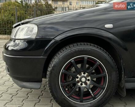 Черный Опель Астра, объемом двигателя 1.4 л и пробегом 205 тыс. км за 3800 $, фото 8 на Automoto.ua