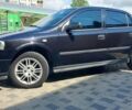 Черный Опель Астра, объемом двигателя 1.6 л и пробегом 245 тыс. км за 5000 $, фото 1 на Automoto.ua