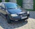 Черный Опель Астра, объемом двигателя 1.6 л и пробегом 245 тыс. км за 5000 $, фото 6 на Automoto.ua