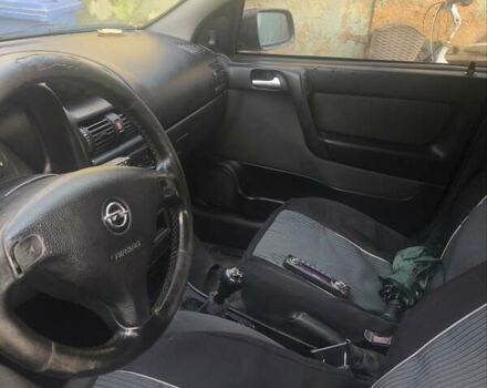 Черный Опель Астра, объемом двигателя 1.4 л и пробегом 250 тыс. км за 1800 $, фото 3 на Automoto.ua