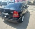 Черный Опель Астра, объемом двигателя 1.6 л и пробегом 250 тыс. км за 4750 $, фото 1 на Automoto.ua