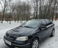 Черный Опель Астра, объемом двигателя 1.6 л и пробегом 282 тыс. км за 4477 $, фото 1 на Automoto.ua
