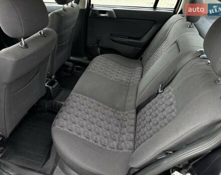 Черный Опель Астра, объемом двигателя 1.4 л и пробегом 205 тыс. км за 3800 $, фото 16 на Automoto.ua