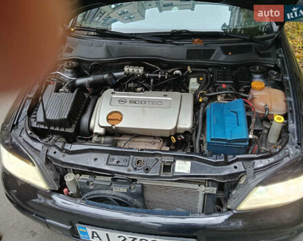 Черный Опель Астра, объемом двигателя 1.6 л и пробегом 274 тыс. км за 3500 $, фото 2 на Automoto.ua