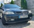 Черный Опель Астра, объемом двигателя 1.6 л и пробегом 245 тыс. км за 5000 $, фото 3 на Automoto.ua