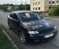 Черный Опель Астра, объемом двигателя 1.6 л и пробегом 193 тыс. км за 2571 $, фото 1 на Automoto.ua