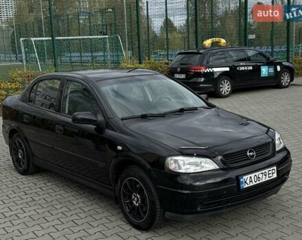 Черный Опель Астра, объемом двигателя 1.4 л и пробегом 205 тыс. км за 3800 $, фото 6 на Automoto.ua