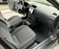 Черный Опель Астра, объемом двигателя 1.4 л и пробегом 205 тыс. км за 3900 $, фото 22 на Automoto.ua