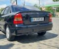 Черный Опель Астра, объемом двигателя 1.6 л и пробегом 245 тыс. км за 5000 $, фото 11 на Automoto.ua