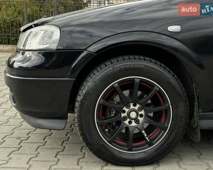 Черный Опель Астра, объемом двигателя 1.4 л и пробегом 205 тыс. км за 3800 $, фото 9 на Automoto.ua