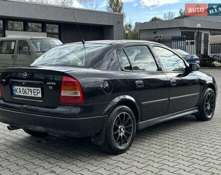 Черный Опель Астра, объемом двигателя 1.4 л и пробегом 205 тыс. км за 3800 $, фото 4 на Automoto.ua