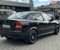 Черный Опель Астра, объемом двигателя 1.4 л и пробегом 205 тыс. км за 3800 $, фото 4 на Automoto.ua