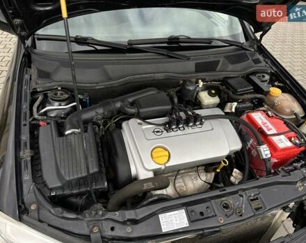 Черный Опель Астра, объемом двигателя 1.4 л и пробегом 205 тыс. км за 3800 $, фото 24 на Automoto.ua