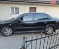 Черный Опель Астра, объемом двигателя 1.6 л и пробегом 319 тыс. км за 3100 $, фото 1 на Automoto.ua