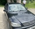 Черный Опель Астра, объемом двигателя 1.6 л и пробегом 300 тыс. км за 1400 $, фото 1 на Automoto.ua
