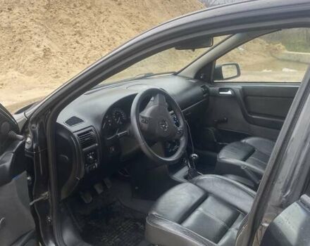 Черный Опель Астра, объемом двигателя 1.4 л и пробегом 349 тыс. км за 3650 $, фото 5 на Automoto.ua