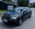 Черный Опель Астра, объемом двигателя 1.39 л и пробегом 215 тыс. км за 3500 $, фото 1 на Automoto.ua