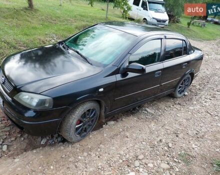 Черный Опель Астра, объемом двигателя 1.4 л и пробегом 320 тыс. км за 3750 $, фото 7 на Automoto.ua