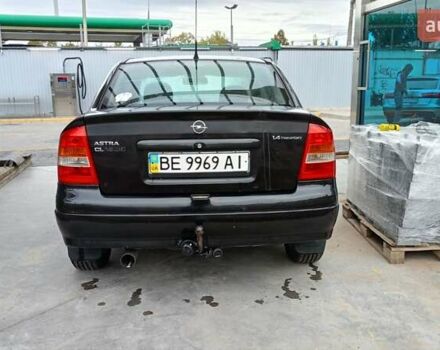 Черный Опель Астра, объемом двигателя 1.36 л и пробегом 291 тыс. км за 4000 $, фото 11 на Automoto.ua