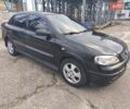 Черный Опель Астра, объемом двигателя 1.4 л и пробегом 217 тыс. км за 2900 $, фото 3 на Automoto.ua