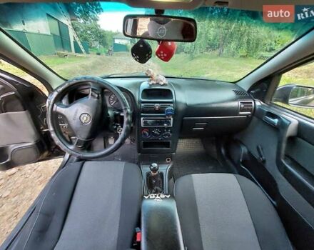 Черный Опель Астра, объемом двигателя 1.4 л и пробегом 320 тыс. км за 3750 $, фото 1 на Automoto.ua