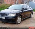 Черный Опель Астра, объемом двигателя 1.4 л и пробегом 330 тыс. км за 3600 $, фото 1 на Automoto.ua