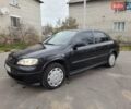 Черный Опель Астра, объемом двигателя 1.39 л и пробегом 333 тыс. км за 3600 $, фото 1 на Automoto.ua