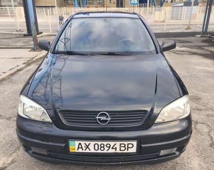 Черный Опель Астра, объемом двигателя 1.4 л и пробегом 217 тыс. км за 2900 $, фото 2 на Automoto.ua