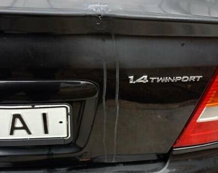 Черный Опель Астра, объемом двигателя 1.36 л и пробегом 291 тыс. км за 4000 $, фото 6 на Automoto.ua