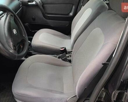 Черный Опель Астра, объемом двигателя 1.36 л и пробегом 291 тыс. км за 4000 $, фото 14 на Automoto.ua