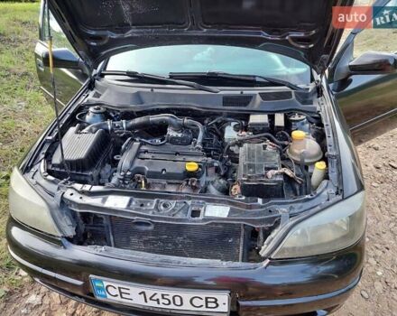Черный Опель Астра, объемом двигателя 1.4 л и пробегом 320 тыс. км за 3750 $, фото 11 на Automoto.ua