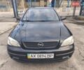 Черный Опель Астра, объемом двигателя 1.4 л и пробегом 217 тыс. км за 2900 $, фото 1 на Automoto.ua