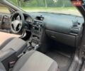 Черный Опель Астра, объемом двигателя 1.4 л и пробегом 146 тыс. км за 3900 $, фото 1 на Automoto.ua