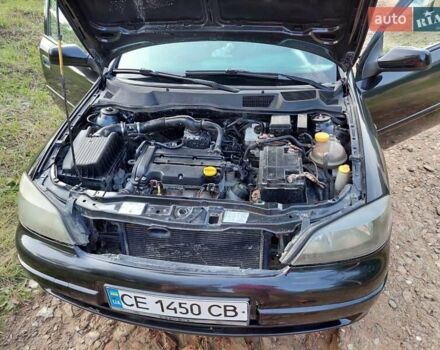 Черный Опель Астра, объемом двигателя 1.4 л и пробегом 320 тыс. км за 3750 $, фото 12 на Automoto.ua