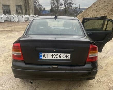 Черный Опель Астра, объемом двигателя 1.4 л и пробегом 349 тыс. км за 3650 $, фото 3 на Automoto.ua