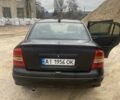 Черный Опель Астра, объемом двигателя 1.4 л и пробегом 349 тыс. км за 3650 $, фото 3 на Automoto.ua