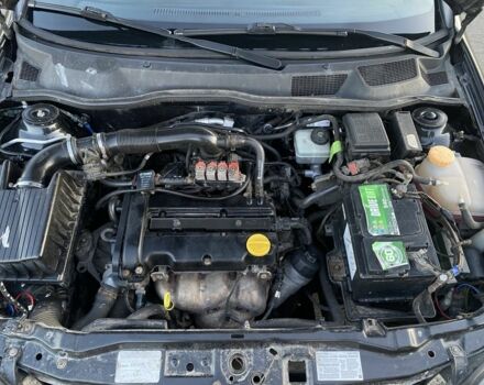 Черный Опель Астра, объемом двигателя 1.4 л и пробегом 300 тыс. км за 2800 $, фото 7 на Automoto.ua