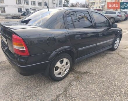 Черный Опель Астра, объемом двигателя 1.4 л и пробегом 217 тыс. км за 2900 $, фото 5 на Automoto.ua