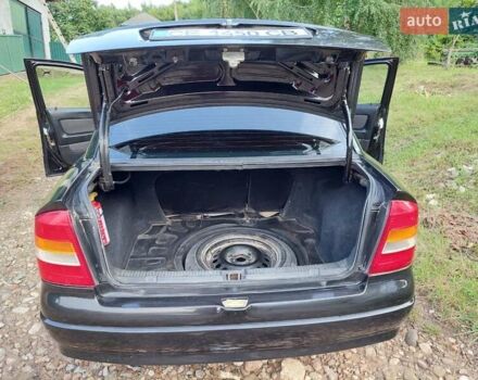 Черный Опель Астра, объемом двигателя 1.4 л и пробегом 320 тыс. км за 3750 $, фото 10 на Automoto.ua