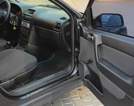 Черный Опель Астра, объемом двигателя 1.4 л и пробегом 166 тыс. км за 4700 $, фото 11 на Automoto.ua