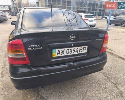 Черный Опель Астра, объемом двигателя 1.4 л и пробегом 217 тыс. км за 2900 $, фото 8 на Automoto.ua